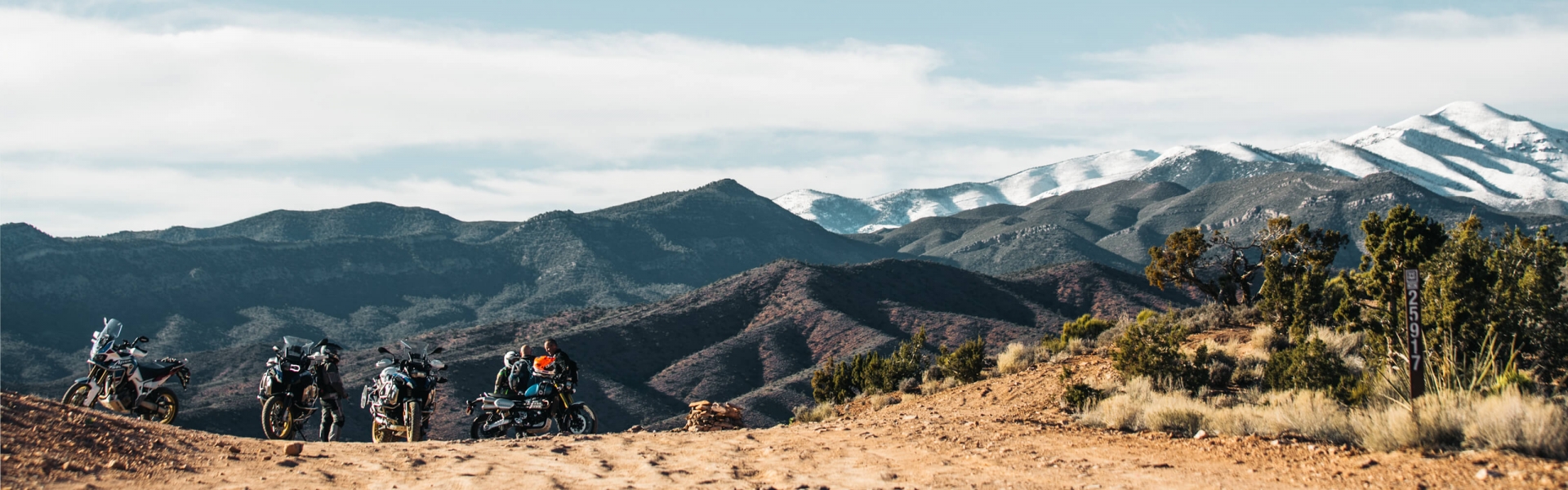 bikers with a mountain landscape backdrop